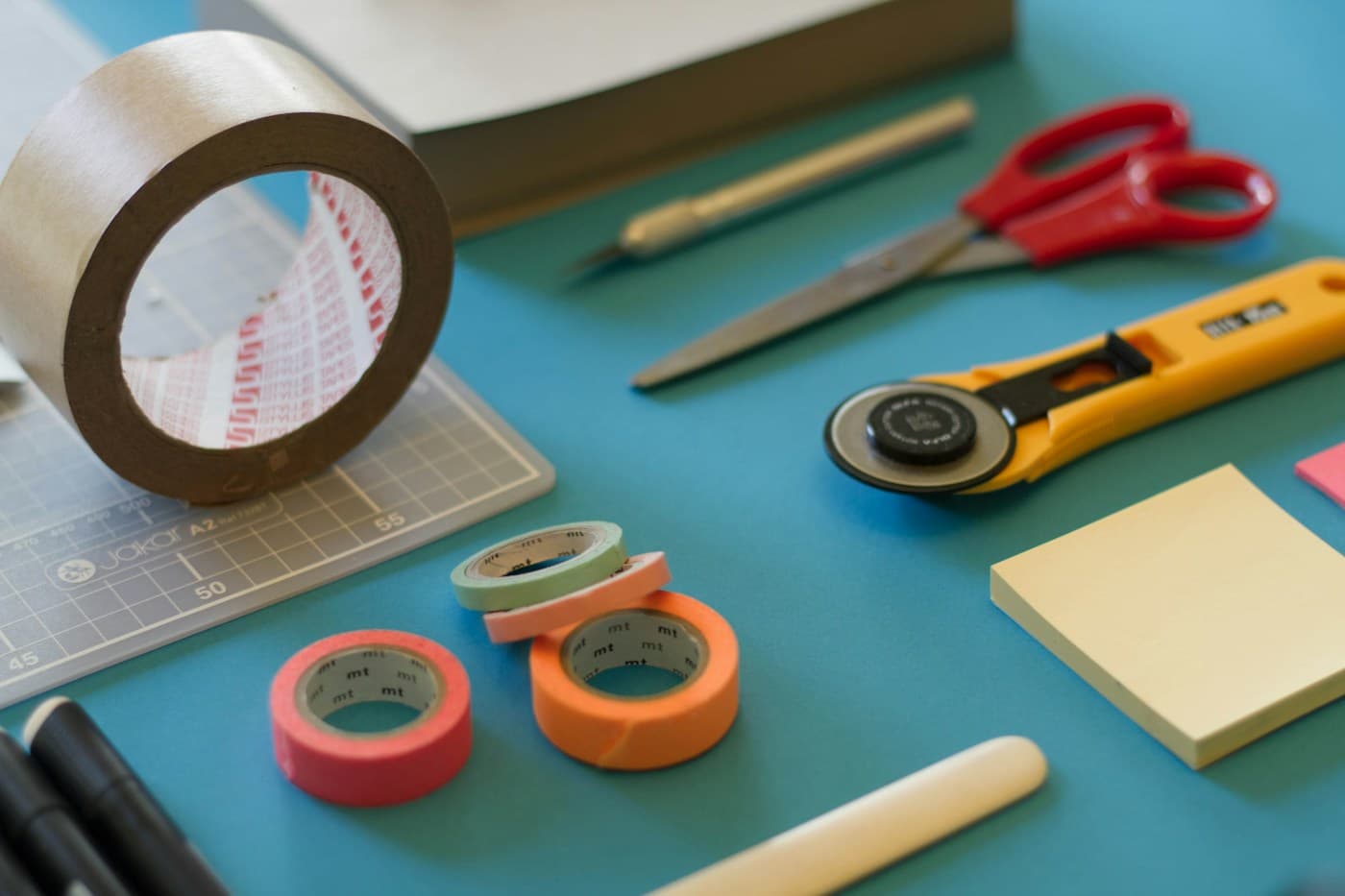 Creative workspace with warm wooden surfaces and craft materials